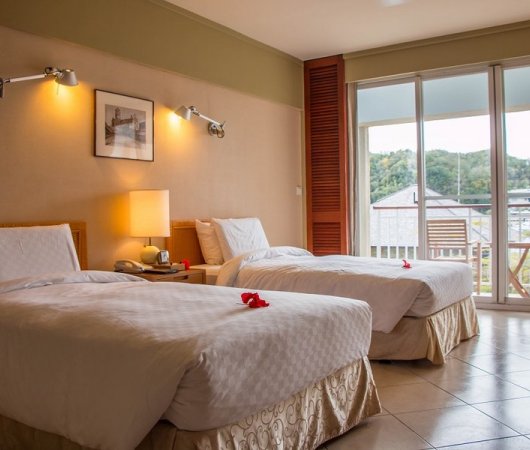 aquarev-plongee-sous-marine-micronesie-palau-sejour-hotel-palau-royal-resort-chambre-superieure-jardin-lits