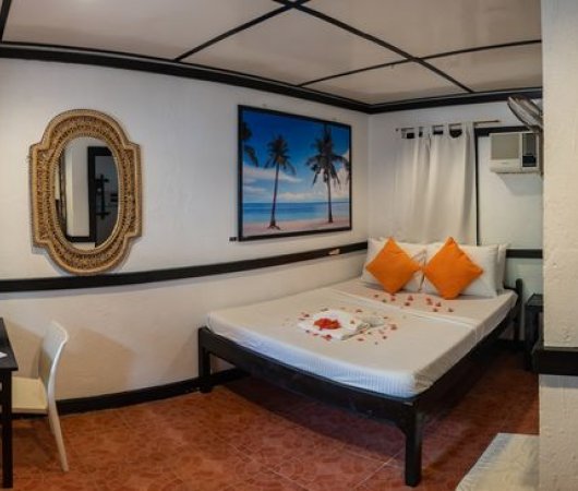 aquarev-plongee-sous-marine-philippines-sejour-malapascua-hotel-hippocampus-beach-resort-chambre-grand-lit